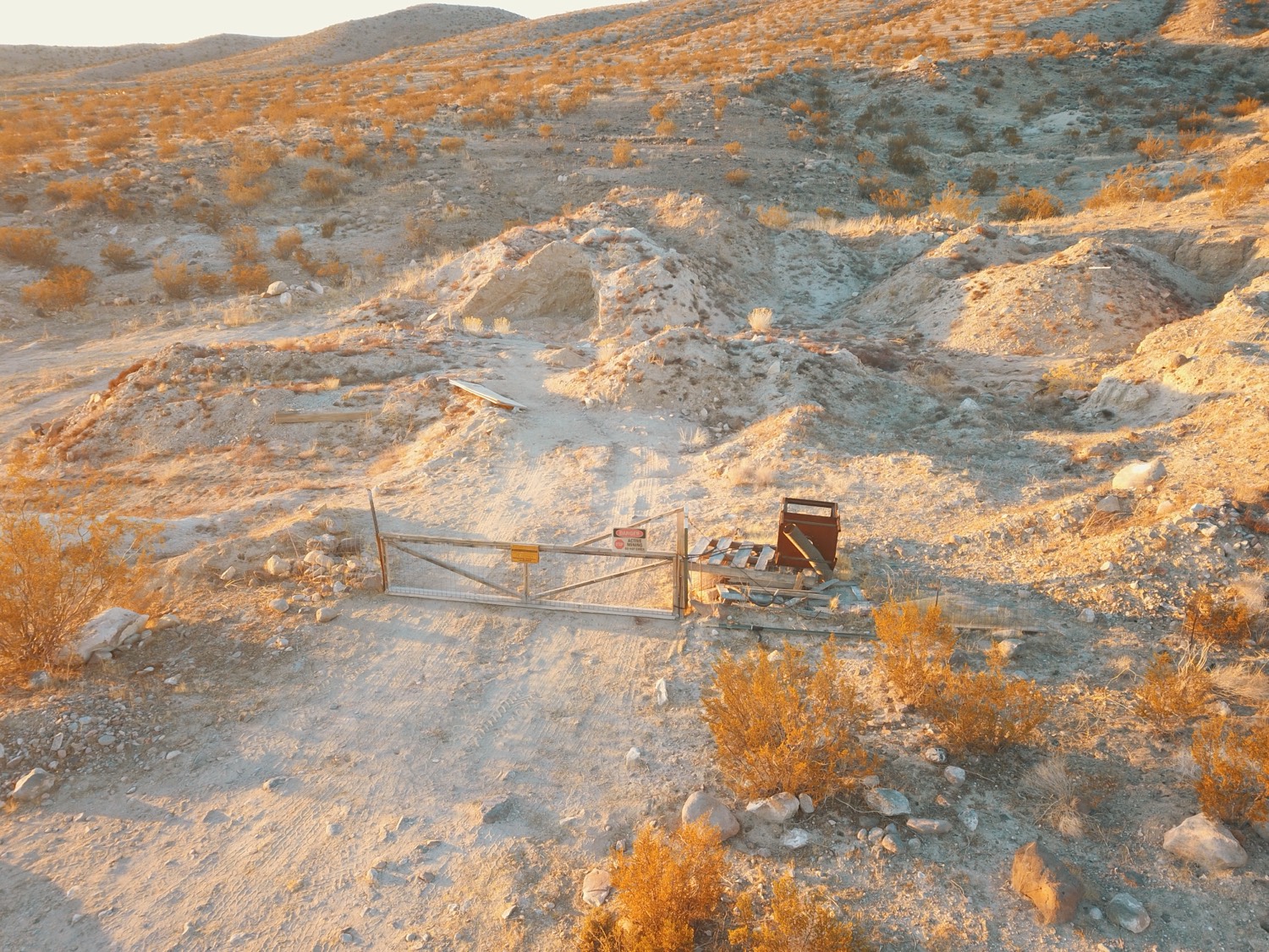 Gate to the gold claims at golden hour